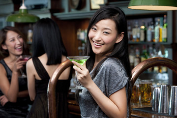 A Woman Relaxing at a Bar