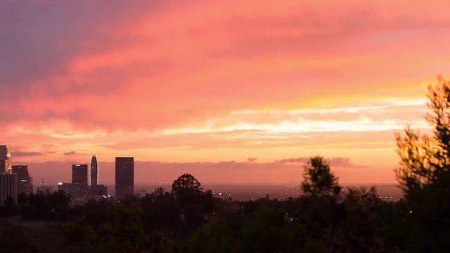 Pan across Los Angeles county to a close view of down town skyscrapers.  Recorded in 4K, ultra high definition.
