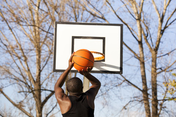 Street basket player playing outdoors
