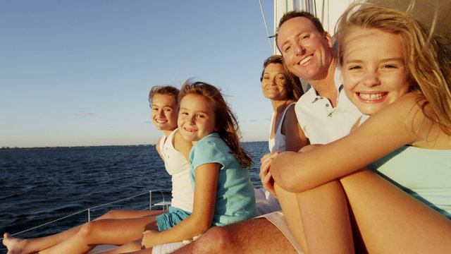 Young Caucasian Sisters Holiday Parents Group Tourism Yacht Sailing Portrait