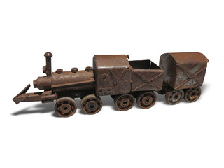 Fototapeta na wymiar Vintage brown rusty steam locomotive iron model isolated