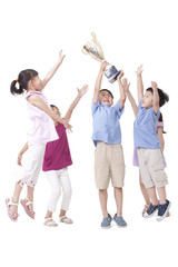Fototapeta premium Happy children and trophy