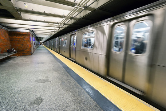 Train On New York City Subway With Homeless Sleeping On The Platform