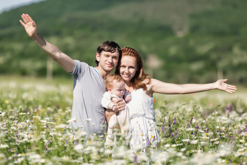 Young family on field