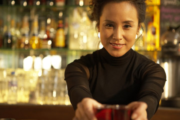 Bartender Serving Cocktail