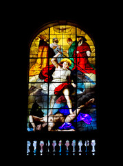Religious scene made out of stained glass in a church