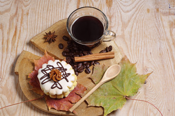 Coffee, cake and autumn leaves