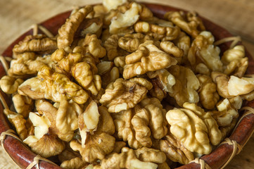 The plate with walnuts 
