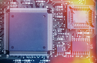 Circuit board with electronic components. Computer and networking communication technology concept....