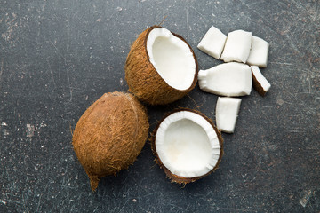 halved and whole coconut