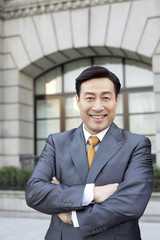 Portrait of businessman on the Bund in Shanghai