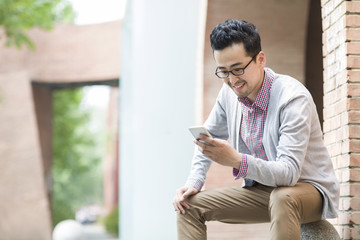 Man using smart phone