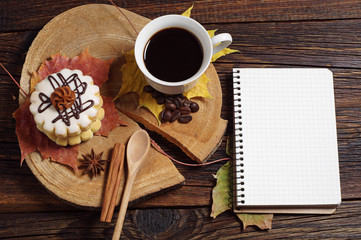 Coffee with cake and notebook