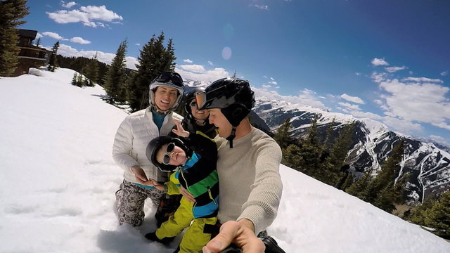 selfie portrait snow outdoor lifestyle Caucasian family sons travel promotion 