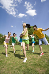 Group of friends playing American Football