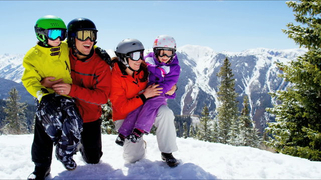 snow outdoor active lifestyle Caucasian family travel promotion winter vacation