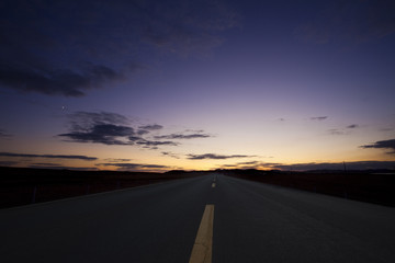 Sunset by a highway