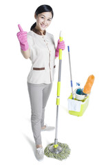 Cleaner holding a mop