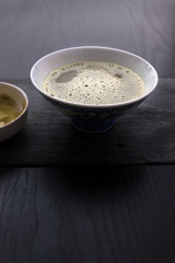The bowl of fresh prepared matcha tea