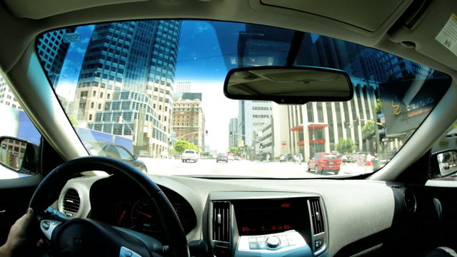 POV driving city streets Skyscrapers Urban district USA