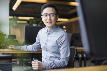 IT worker sitting in office
