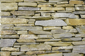 The texture of multicolored bricks.