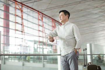 Mature man waiting at airport