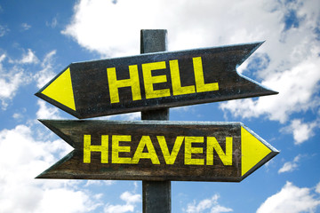 Hell - Heaven signpost with sky background