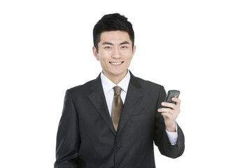 Young businessman text messaging