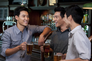 Friends Relaxing at a Bar