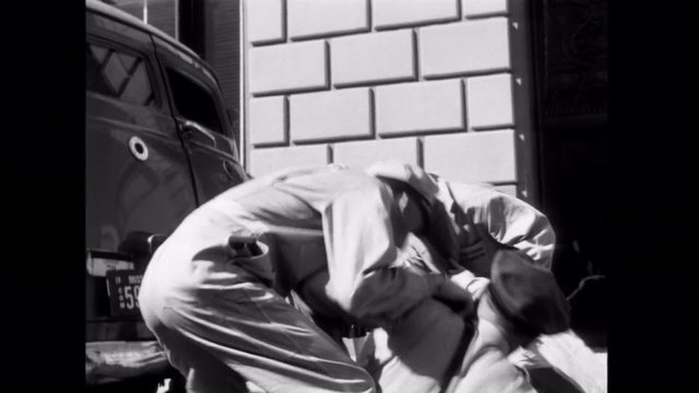 Robbers pulling off Brinks heist, 1950s