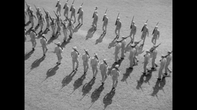 High angle shot of  soldiers marching at Army base