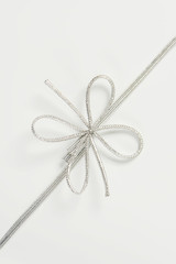 Silver string bow
