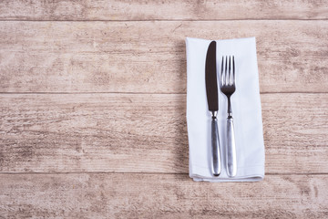 consept as invitation for dinner on wooden table