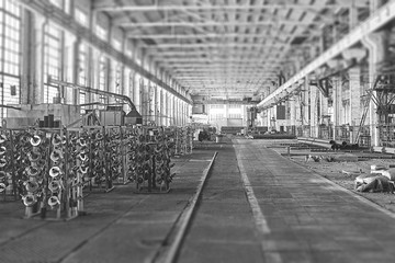 Long industrial warehouse of pipe plant