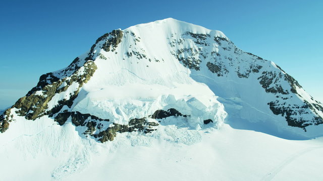 Aerial Swiss Monch summit Alps snow ice snow skiing sport 