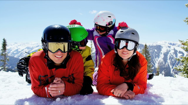 portrait snow outdoor active Caucasian family travel promotion winter vacation