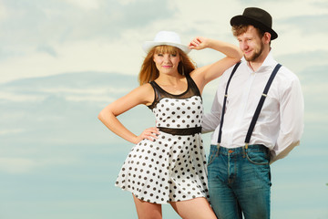 Loving couple retro style flirting outdoor