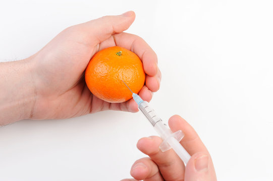mandarin with syringe
