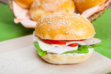 Sandwich with bacon and vegetables