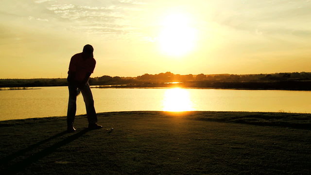 Male Caucasian Professional Golfer Sport Game Sunset Golf Bag Clubs Swing 