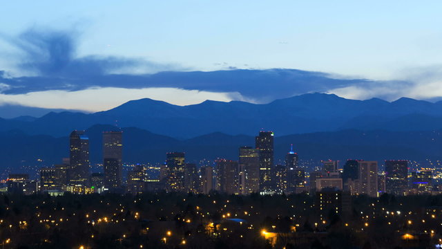 illuminated skyline Denver USA downtown city building Rockies mountain travel time lapse