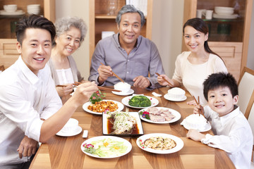 Happy family enjoying meal time