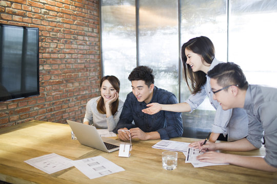 Business people having meeting in board room