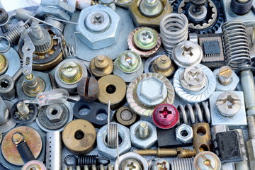 Large collection of various metal objects as screws, bolts, heads, nuts.....