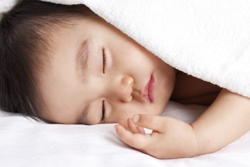Obraz na płótnie Canvas Lovely baby boy in sweet dream