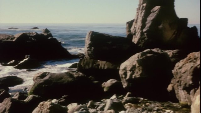 Panning shot of rocky California coastline,1960s