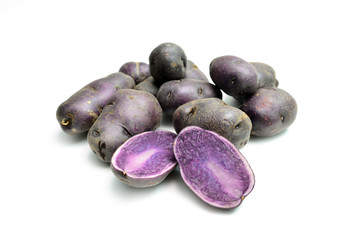purple potatoes on white