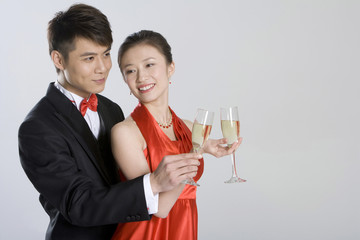 Young couple in evening wear
