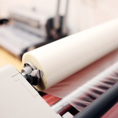 The image of a laminating machine